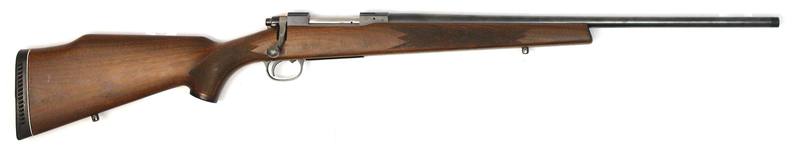 Buy 222 Tikka M55 Blued Wood 22.5" Threaded in NZ New Zealand.