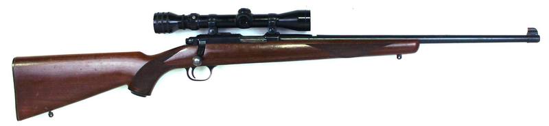 Buy 22 Ruger 77/22 Blued Wood with 3-9x40 Scope in NZ New Zealand.