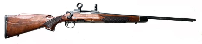 Buy 243 Remington Model 700 BDL Blued Wood Threaded in NZ New Zealand.