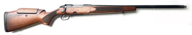 Buy 222 Tikka M595 Blued Wood Threaded with Adjustable Comb in NZ New Zealand.