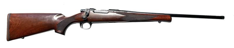 Buy 223 Remington Model 7 Blued Wood Threaded in NZ New Zealand.